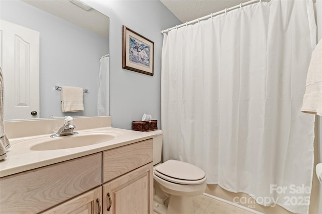 full bathroom with toilet, vanity, a textured ceiling, and shower / bath combo with shower curtain