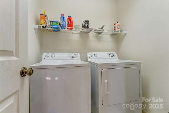 laundry area featuring separate washer and dryer