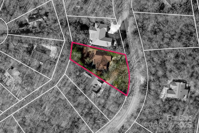aerial overview of property's location featuring property boundaries highlighted