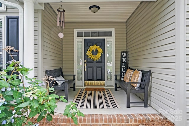 146 Burtons Barn Rd, Mooresville, NC 28115 - view of exterior entry featuring a porch