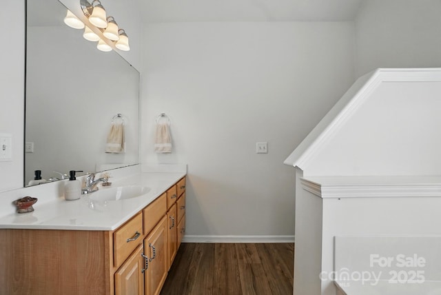 146 Burtons Barn Rd, Mooresville, NC 28115 - bathroom featuring wood finished floors, vanity, and baseboards