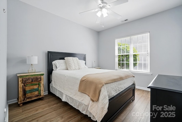 146 Burtons Barn Rd, Mooresville, NC 28115 - bedroom featuring wood finished floors, baseboards, and ceiling fan