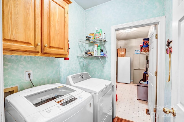 5238 Downing Creek Dr, Charlotte, NC 28269 - laundry area featuring cabinet space, independent washer and dryer, and light floors