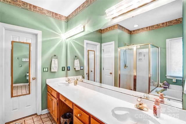 5238 Downing Creek Dr, Charlotte, NC 28269 - bathroom featuring a stall shower, double vanity, tile patterned flooring, and baseboards