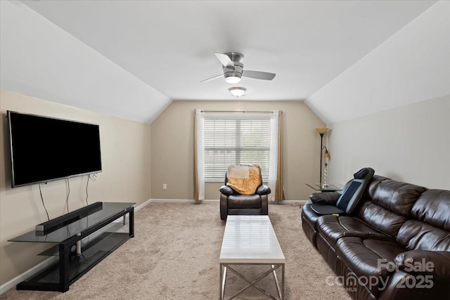 living room featuring vaulted ceiling, a ceiling fan, light carpet, and baseboards