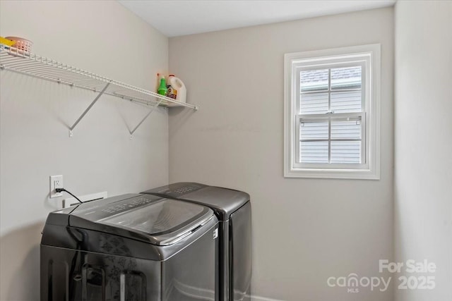 washroom featuring independent washer and dryer