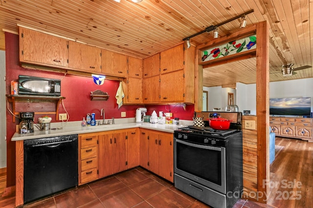 1925 Green Hill Rd, Blowing Rock, NC 28605 - kitchen with black appliances, track lighting, wood ceiling, light countertops, and a sink