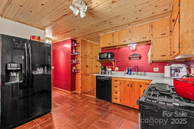 1925 Green Hill Rd, Blowing Rock, NC 28605 - kitchen with black appliances, a sink, light countertops, dark tile patterned flooring, and wood ceiling