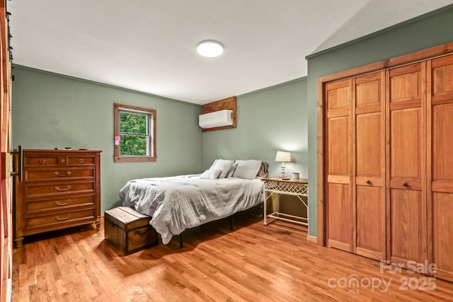 1925 Green Hill Rd, Blowing Rock, NC 28605 - bedroom with an AC wall unit and light wood-type flooring
