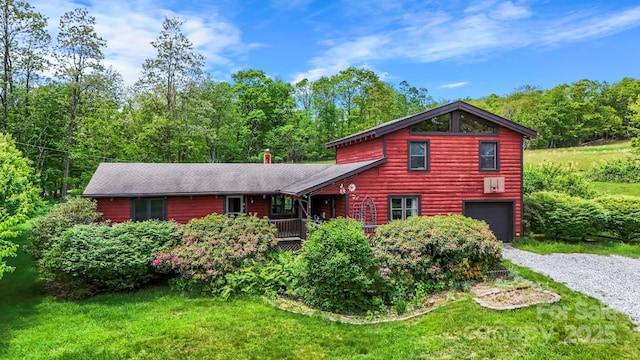 1925 Green Hill Rd, Blowing Rock, NC 28605 - rustic home featuring driveway, an attached garage, a front yard, and a chimney
