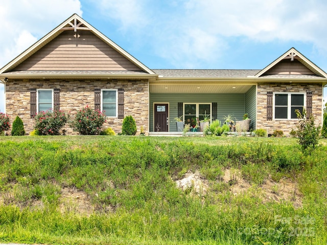 5 S Pine Dr, Weaverville, NC 28787 - craftsman house featuring stone siding and roof with shingles