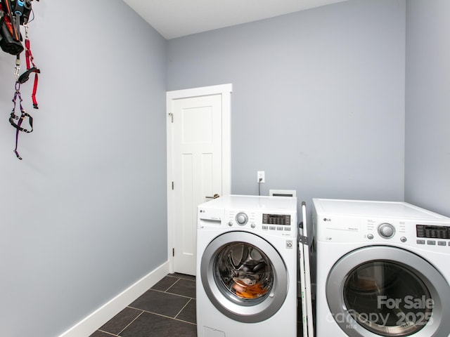 5 S Pine Dr, Weaverville, NC 28787 - clothes washing area with washer and dryer, dark tile patterned floors, and baseboards