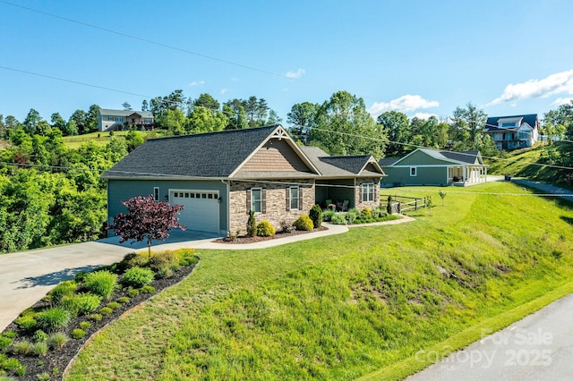 5 S Pine Dr, Weaverville, NC 28787 - view of front facade featuring stone siding, driveway, a garage, and a front yard