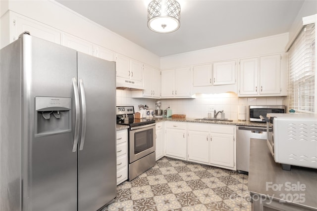 8306 Knights Bridge Rd, Charlotte, NC 28210 - kitchen featuring stainless steel appliances, a sink, under cabinet range hood, and white cabinets
