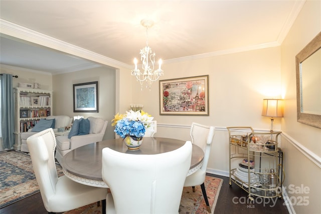 8306 Knights Bridge Rd, Charlotte, NC 28210 - dining area with ornamental molding, wood finished floors, and a chandelier