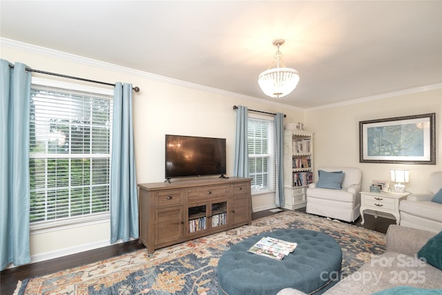 8306 Knights Bridge Rd, Charlotte, NC 28210 - living area with crown molding, wood finished floors, baseboards, and a chandelier