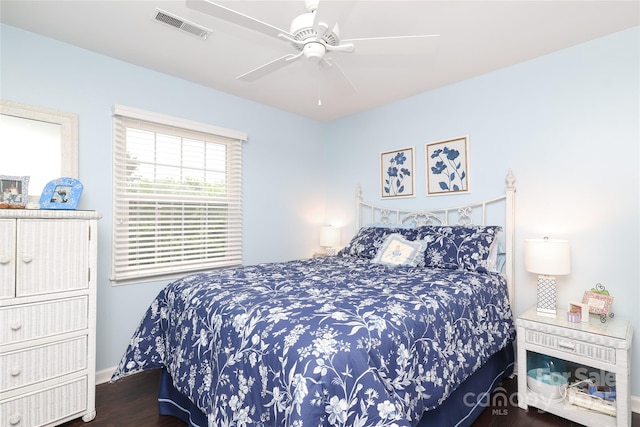 8306 Knights Bridge Rd, Charlotte, NC 28210 - bedroom with wood finished floors, baseboards, and a ceiling fan