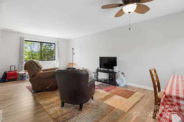 319 Greenville Hwy Unit 302, Brevard, NC 28712 - living room with wood finished floors, a ceiling fan, and baseboards