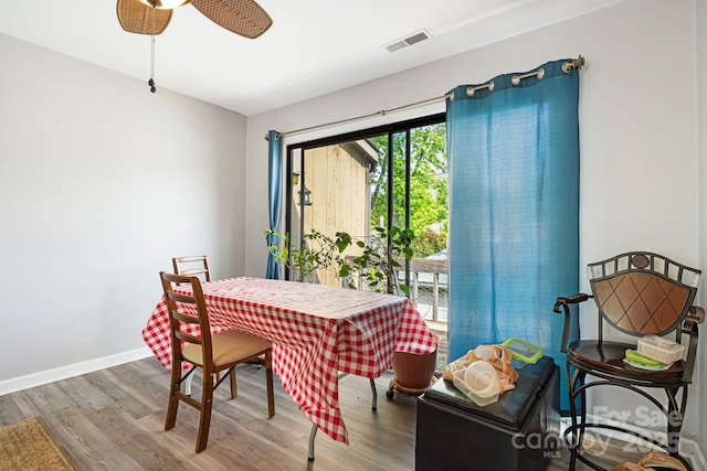 319 Greenville Hwy Unit 302, Brevard, NC 28712 - dining area with wood finished floors, ceiling fan, and baseboards