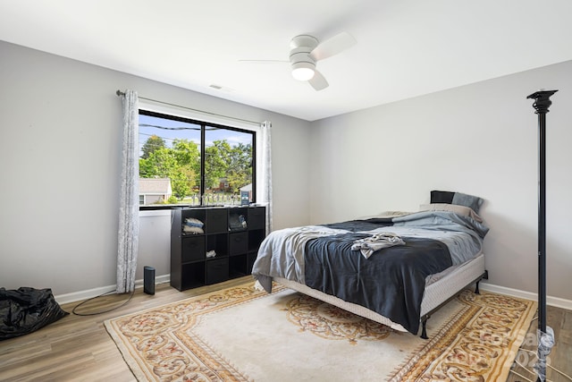 319 Greenville Hwy Unit 302, Brevard, NC 28712 - bedroom featuring wood finished floors, baseboards, and a ceiling fan
