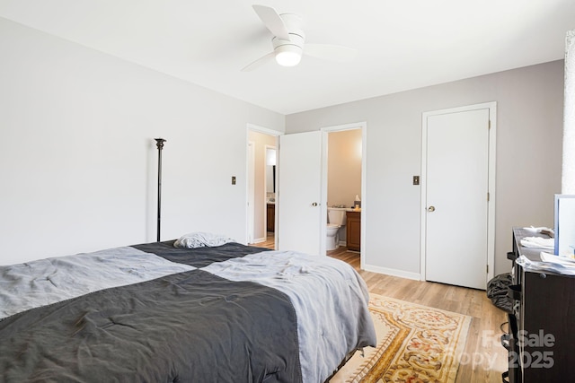 319 Greenville Hwy Unit 302, Brevard, NC 28712 - bedroom featuring light wood finished floors, ensuite bath, and ceiling fan