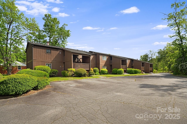 319 Greenville Hwy Unit 302, Brevard, NC 28712 - view of building exterior featuring uncovered parking