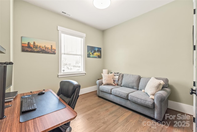 5210 Kelly St, Charlotte, NC 28205 - home office with wood finished floors and baseboards