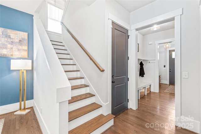5210 Kelly St, Charlotte, NC 28205 - stairway with wood finished floors and baseboards