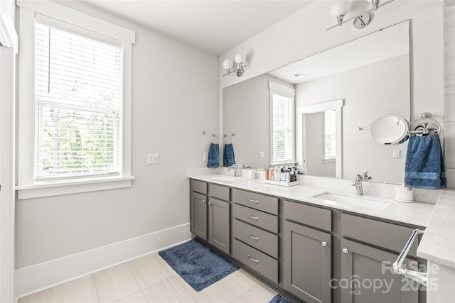 5210 Kelly St, Charlotte, NC 28205 - full bath featuring plenty of natural light, double vanity, and baseboards