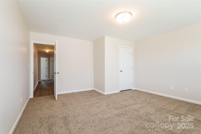 2327 Glenway Trail Ct, Pineville, NC 28134 - carpeted spare room featuring baseboards