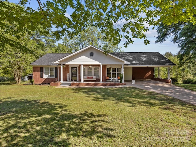 1544 US-221A Hwy, Mooresboro, NC 28114 - ranch-style home with a porch, concrete driveway, brick siding, and a front yard
