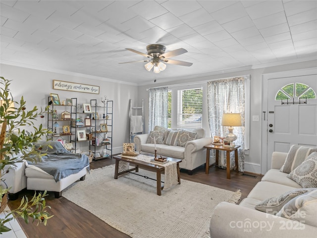 1544 US-221A Hwy, Mooresboro, NC 28114 - living room with crown molding, a ceiling fan, wood finished floors, and baseboards