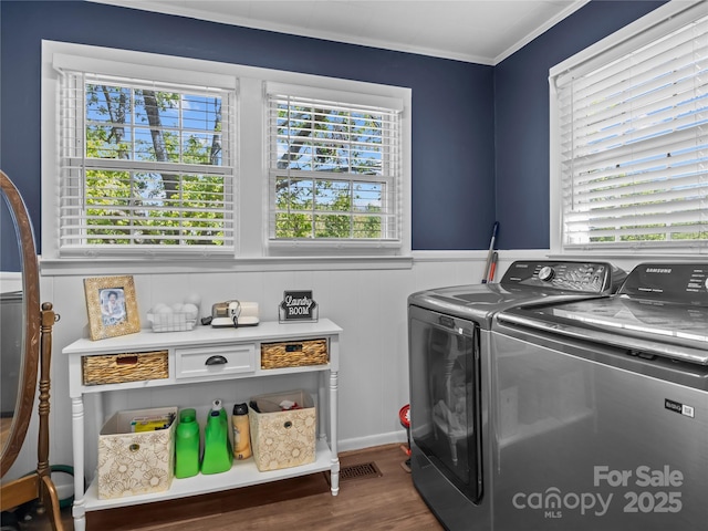 1544 US-221A Hwy, Mooresboro, NC 28114 - laundry room with independent washer and dryer, plenty of natural light, wood finished floors, a wainscoted wall, and ornamental molding