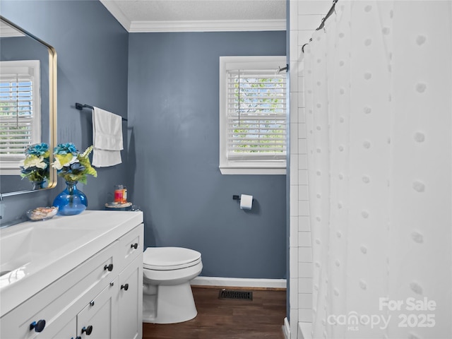 1544 US-221A Hwy, Mooresboro, NC 28114 - bathroom with toilet, baseboards, wood finished floors, vanity, and crown molding