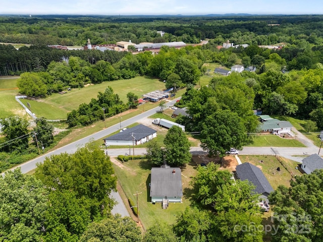 drone / aerial view of a heavily wooded area