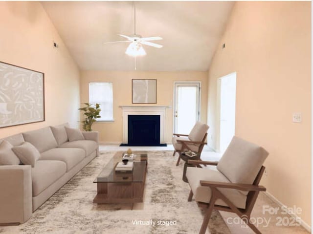 318 Linsbury Ct, Gastonia, NC 28056 - living room featuring a ceiling fan, high vaulted ceiling, a fireplace, and baseboards