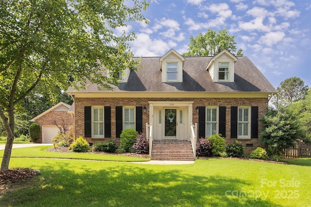 1208 Chausley Ct, Charlotte, NC 28211 - new england style home featuring brick siding, a front yard, a garage, and a shingled roof