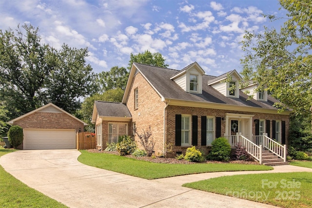 1208 Chausley Ct, Charlotte, NC 28211 - cape cod-style house with brick siding, a garage, an outbuilding, and a shingled roof