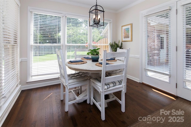 1208 Chausley Ct, Charlotte, NC 28211 - dining room with a chandelier, ornamental molding, dark wood-style floors, baseboards, and healthy amount of natural light