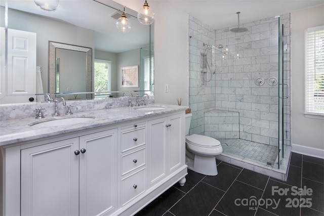 1208 Chausley Ct, Charlotte, NC 28211 - full bathroom with a stall shower, double vanity, tile patterned floors, toilet, and plenty of natural light
