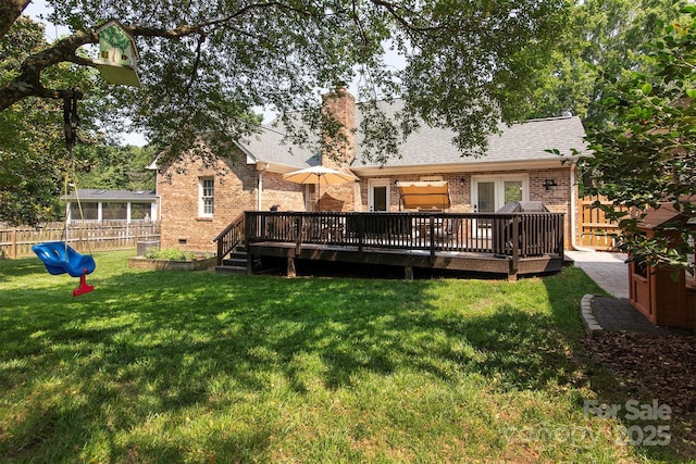 1208 Chausley Ct, Charlotte, NC 28211 - rear view of house with brick siding, a wooden deck, and a chimney