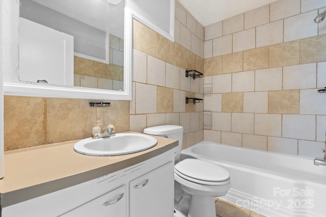 2336 32nd St NE, Hickory, NC 28601 - full bathroom featuring tile walls, decorative backsplash, toilet, vanity, and shower / tub combination