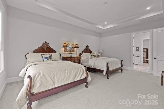 carpeted bedroom with a tray ceiling, baseboards, ornamental molding, and recessed lighting
