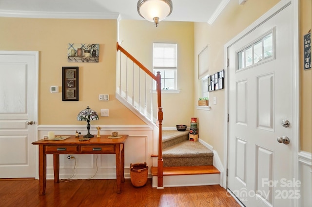 541 River Park Rd, Belmont, NC 28012 - foyer with stairs, crown molding, wood finished floors, and wainscoting