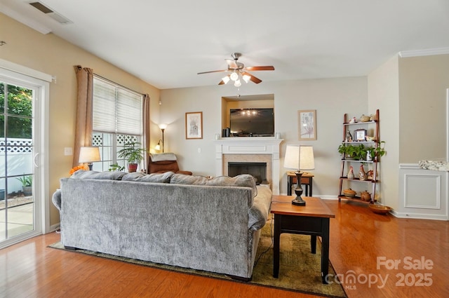 541 River Park Rd, Belmont, NC 28012 - living area with a ceiling fan, a fireplace, and wood finished floors