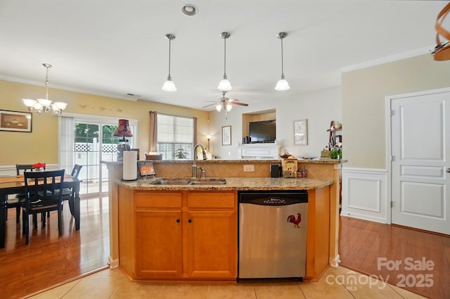 541 River Park Rd, Belmont, NC 28012 - kitchen featuring stainless steel dishwasher, a sink, a chandelier, light stone counters, and crown molding