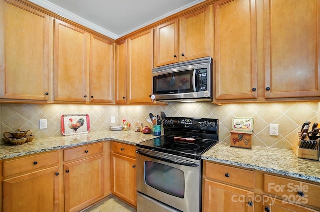 541 River Park Rd, Belmont, NC 28012 - kitchen featuring appliances with stainless steel finishes, light stone countertops, and decorative backsplash