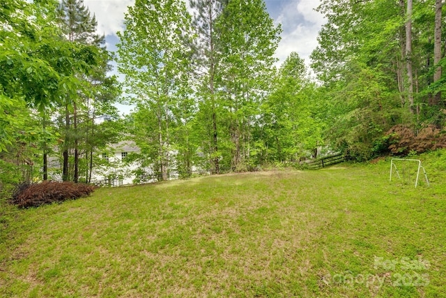 view of yard featuring fence