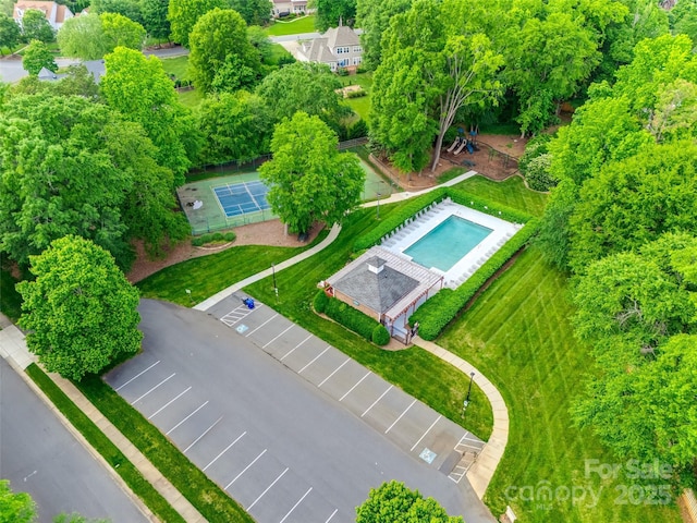 drone / aerial view of a pool