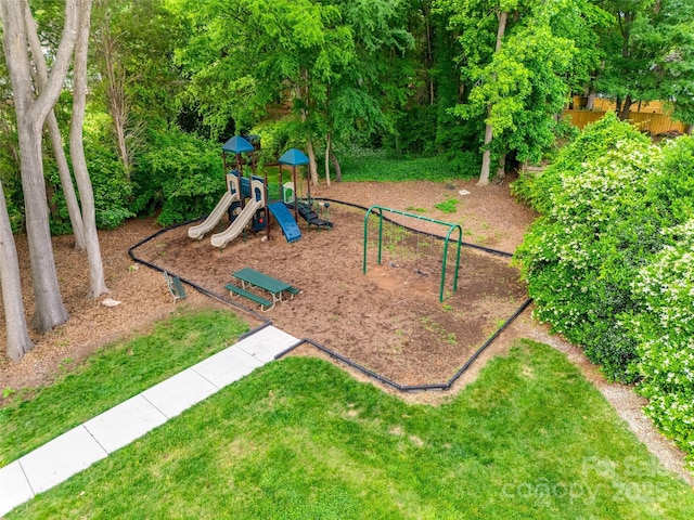 community jungle gym featuring fence